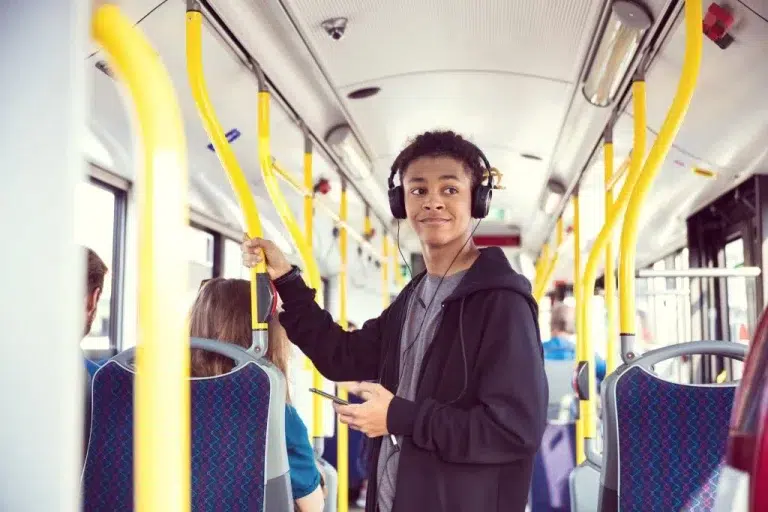 Smiling younger man with phone iStock 1223638629 1 1024x683 1