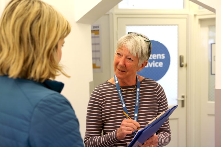 Citizens Advice volunteer talking to a resident